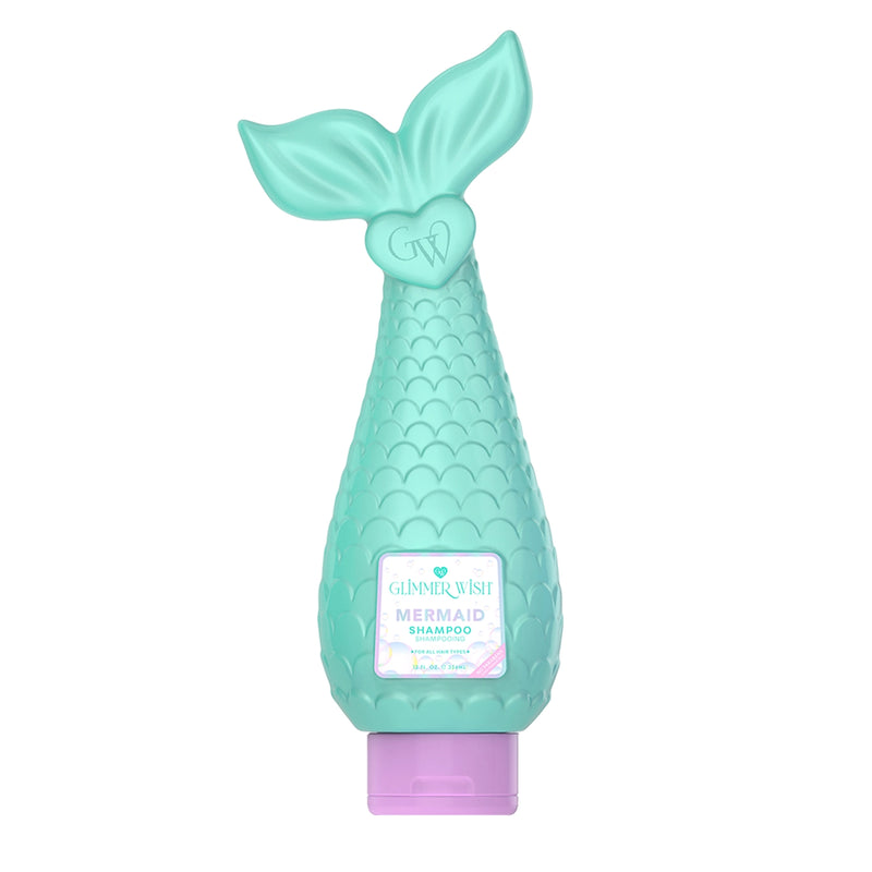 Aqua mermaid tail bottle of Mermaid Shampoo with beachy label and purple cap.