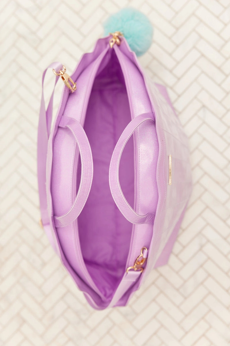 Overhead view of Mermaid Shell Overnight Bag showing spacious interior and dual handles.