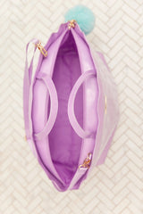 Overhead view of Mermaid Shell Overnight Bag showing spacious interior and dual handles.