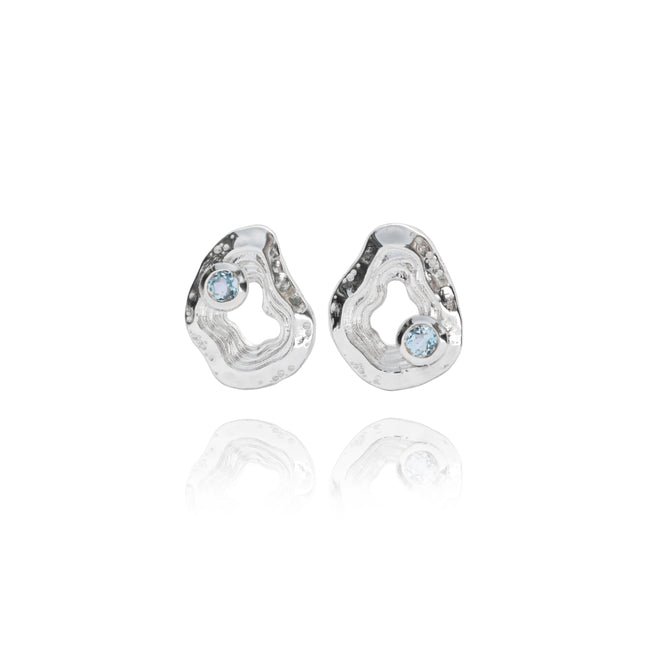 Oasis ear studs jewelry in sterling silver with blue topaz gemstone