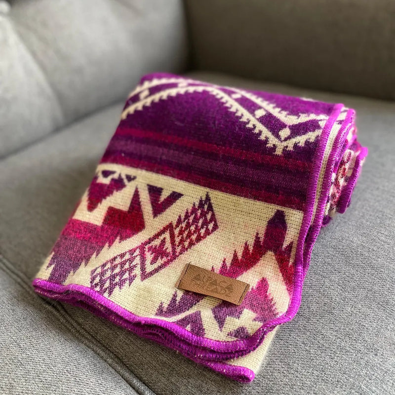 Pink/Magenta Alpaca Baby Blanket folded into a square, detail shot for texture and pattern visibility.