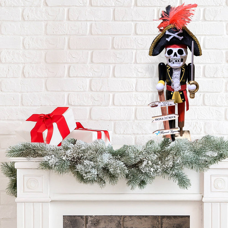 14 inch Pirate Nutcracker displayed on Christmas mantel with greenery and holiday décor