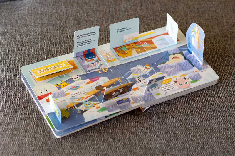 Children's book with interactive elements on a textured surface