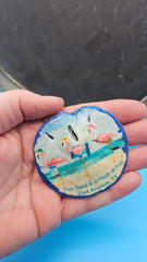 Port Aransas sand dollar magnet “Flock of Fun” coastal souvenir decor
