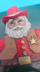 Western-style Santa ornament with hat and badge – rustic holiday decoration