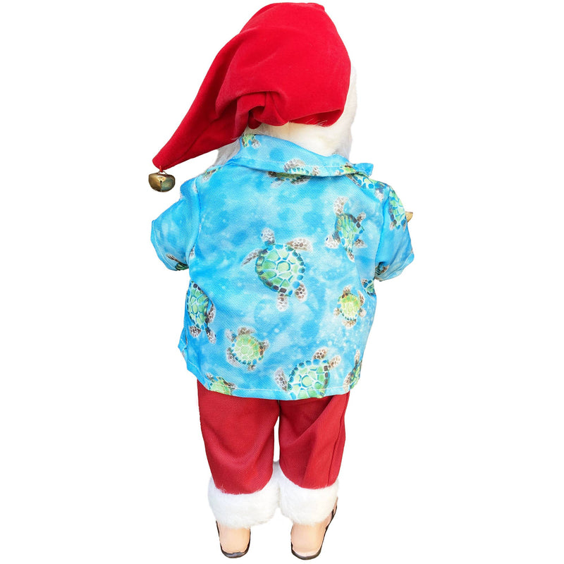 Back view of Santa figurine wearing blue Hawaiian shirt with tropical pattern and red shorts