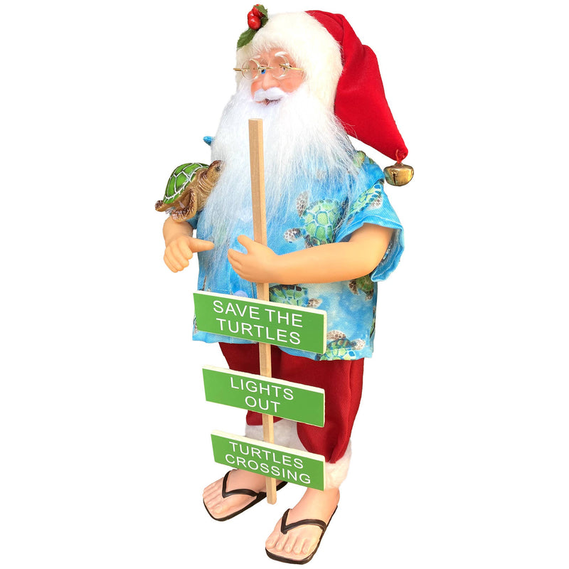 Side angle of Santa figurine showing blue Hawaiian shirt, red shorts, and sea turtle detail