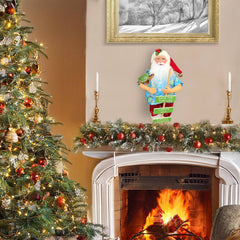 15 inch Save the Turtles Claus displayed on Christmas mantel with greenery and holiday garland