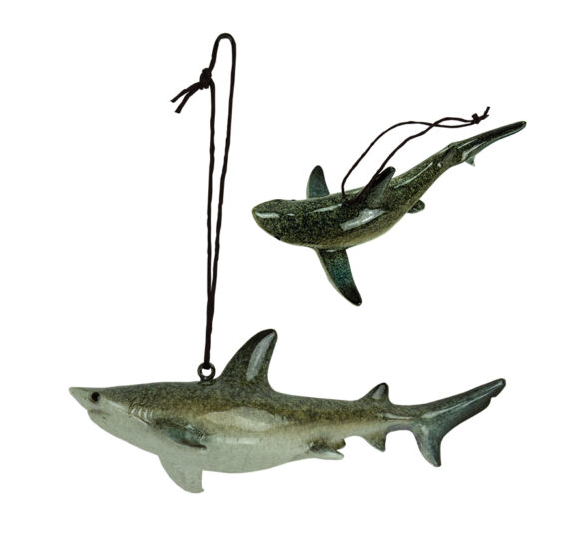 Realistic resin shark ornament with detailed fins and hanging cord for coastal or holiday décor.
