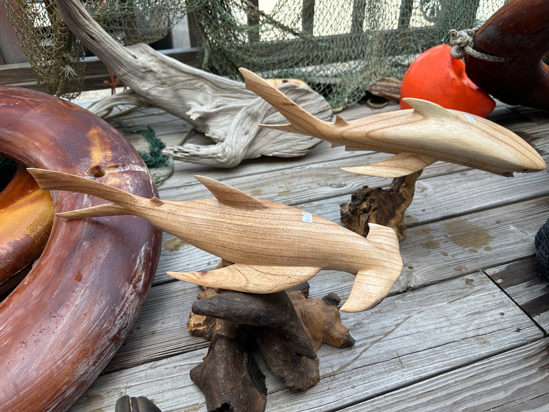 Top view of Shark and Hammerhead Driftwood Sculptures displayed together