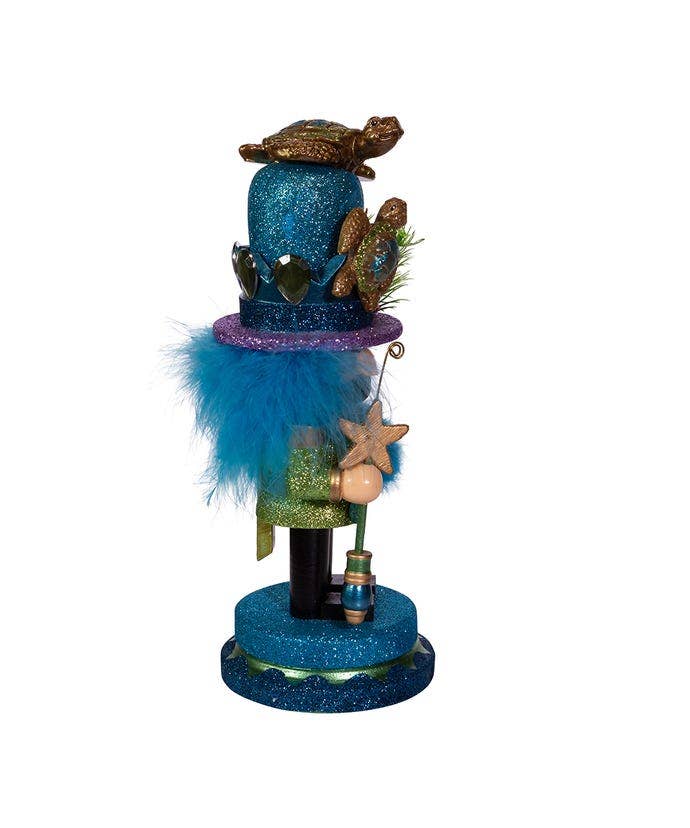Christmas nutcracker in coastal style with sea turtle hat – seasonal holiday decoration