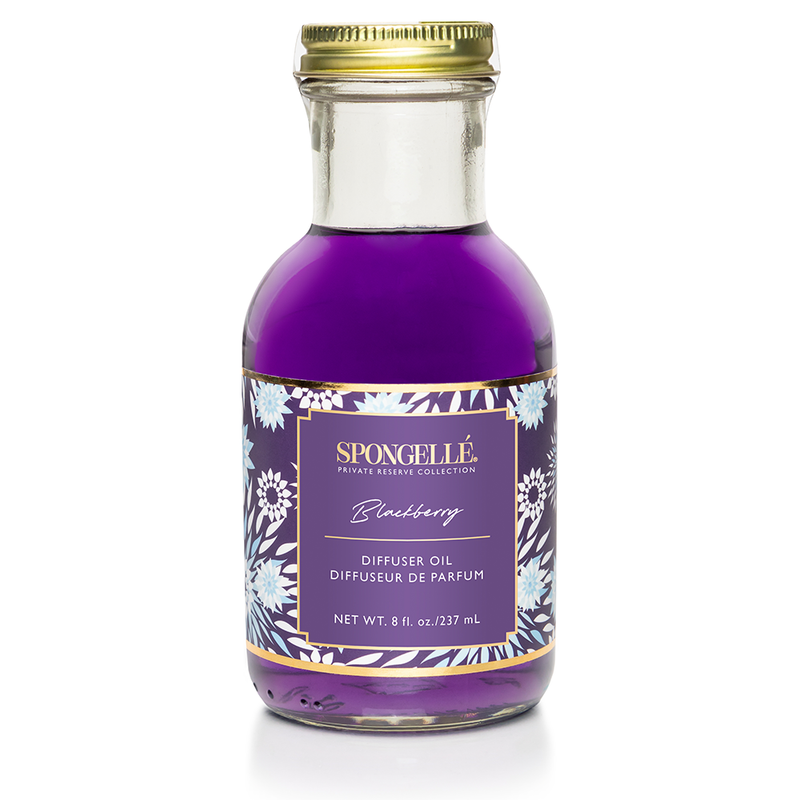 Close-up of Spongellé Blackberry Diffuser Oil front label showing purple oil and gold cap