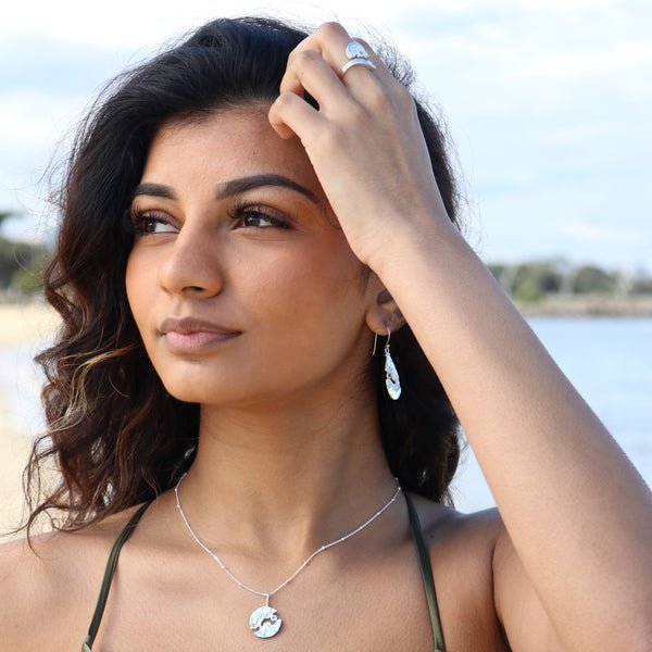 Ocean inspired silver necklace with flowing design – BoldB Serenity Collection
