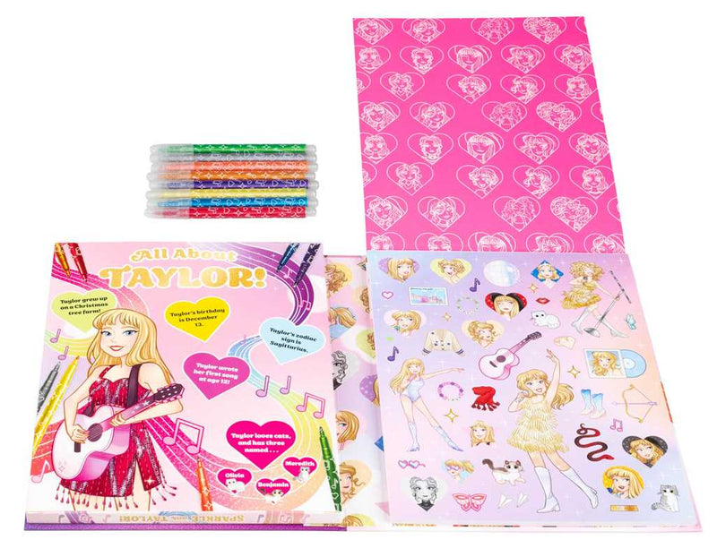 Collection of items including a pink notebook with character patterns, a book titled 'All About Taylor', and colorful ribbons on a white background.