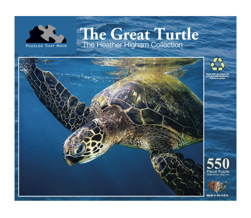 The Great Turtle jigsaw puzzle box featuring a sea turtle swimming in clear blue waters, photographed by Heather Higham, 550 pieces.