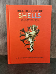 Cover of The Little Book of Shells: Gems of Nature by M.G. Harasewych and Fabio Moretzsohn, featuring an intricate shell illustration.