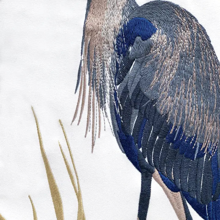 Close-up of embroidered great blue heron detail - coastal pillow cover