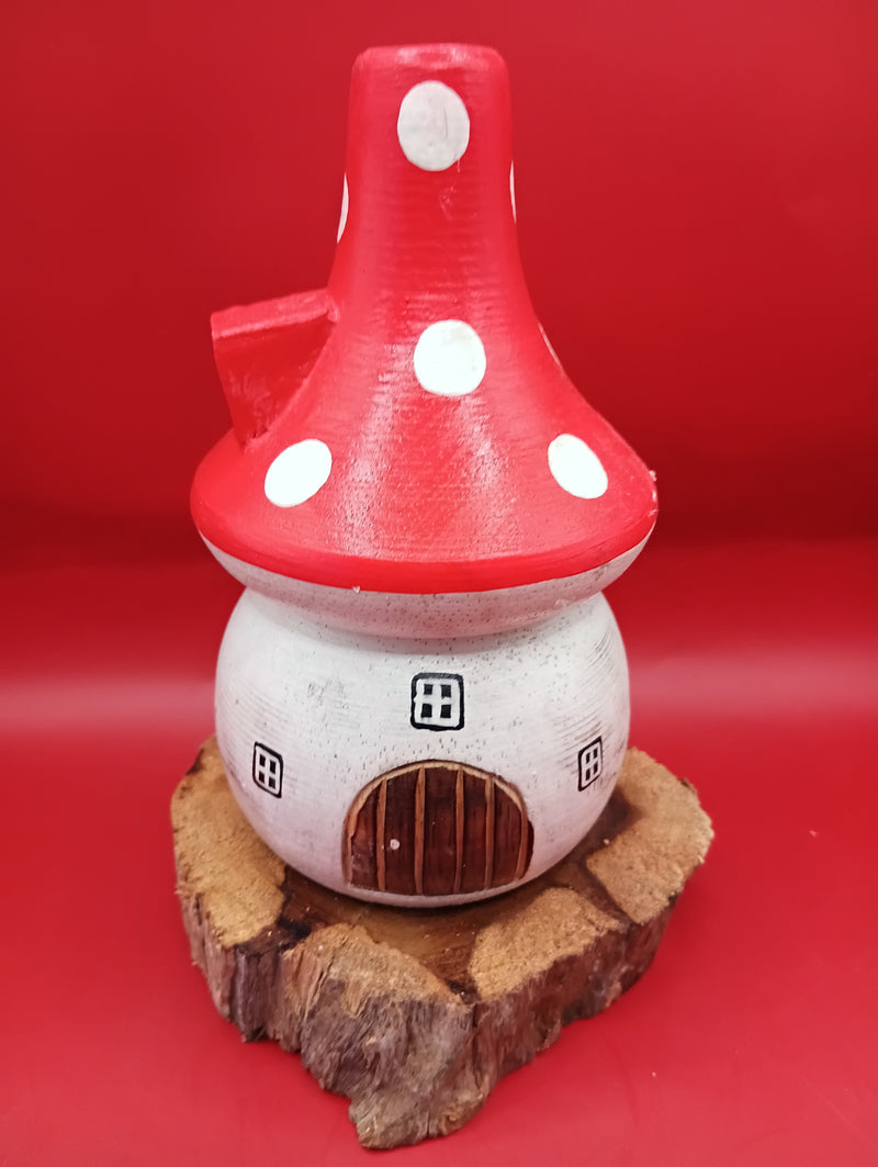 Wooden mushroom house accent with red polka dot roof and rustic wood base – patio garden decor