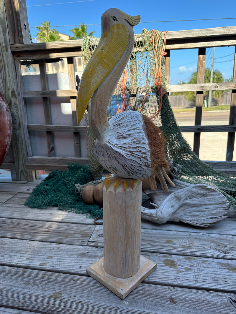 Coconut Pelican Statue with Coconut Body and Wooden Neck in yellow. Handmade and unique.