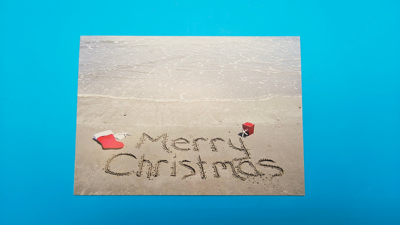 Merry Christmas beach card with sand writing