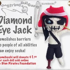 Handmade Diamond Eye Jack String Doll Keychain with a pirate-inspired design featuring fabric tag and lobster clasp.