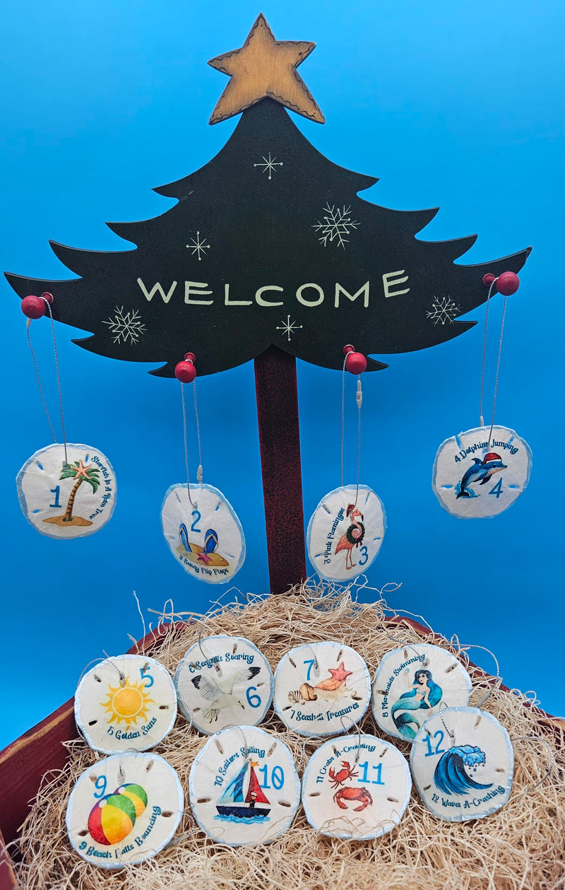 Handcrafted seaside sand dollar ornaments with coastal 12 Days of Christmas designs – nautical Christmas decor