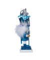 Decorative nutcracker with blue outfit and white cloud-like design on a white background