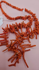 25g strand of natural Mediterranean red coral beads in branch shapes. Perfect for DIY artisan jewelry making and bold coastal designs.