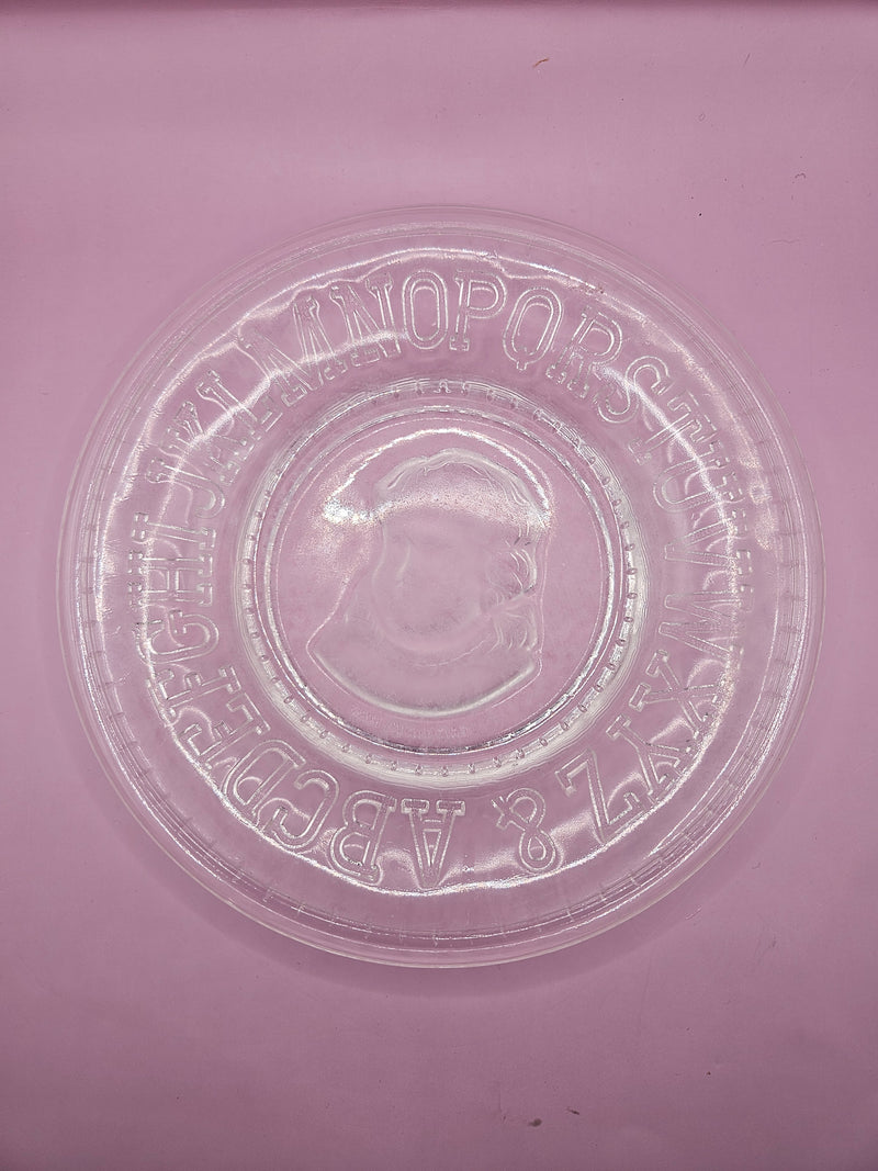  Vintage clear pressed glass child’s plate with alphabet border and cameo design, 8 inches.