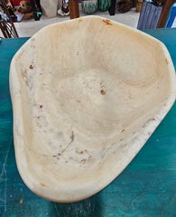 Oversized hand-carved onyx bowl in cream tones with natural marbling, measuring 20 inches wide.