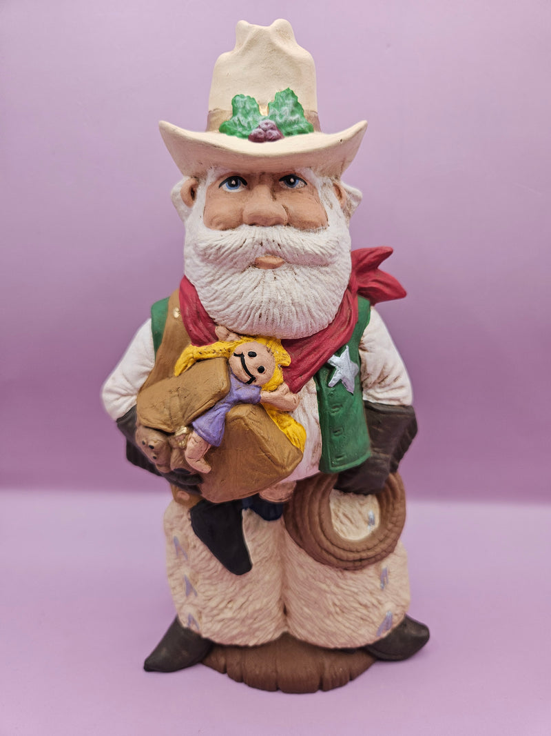 Handmade Western Santa with cowboy hat, toy bag, and lasso, 8.5"x4"