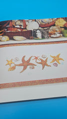A Passion for Sea Glass by C.S. Lambert featuring sea glass collection and mosaic artwork.