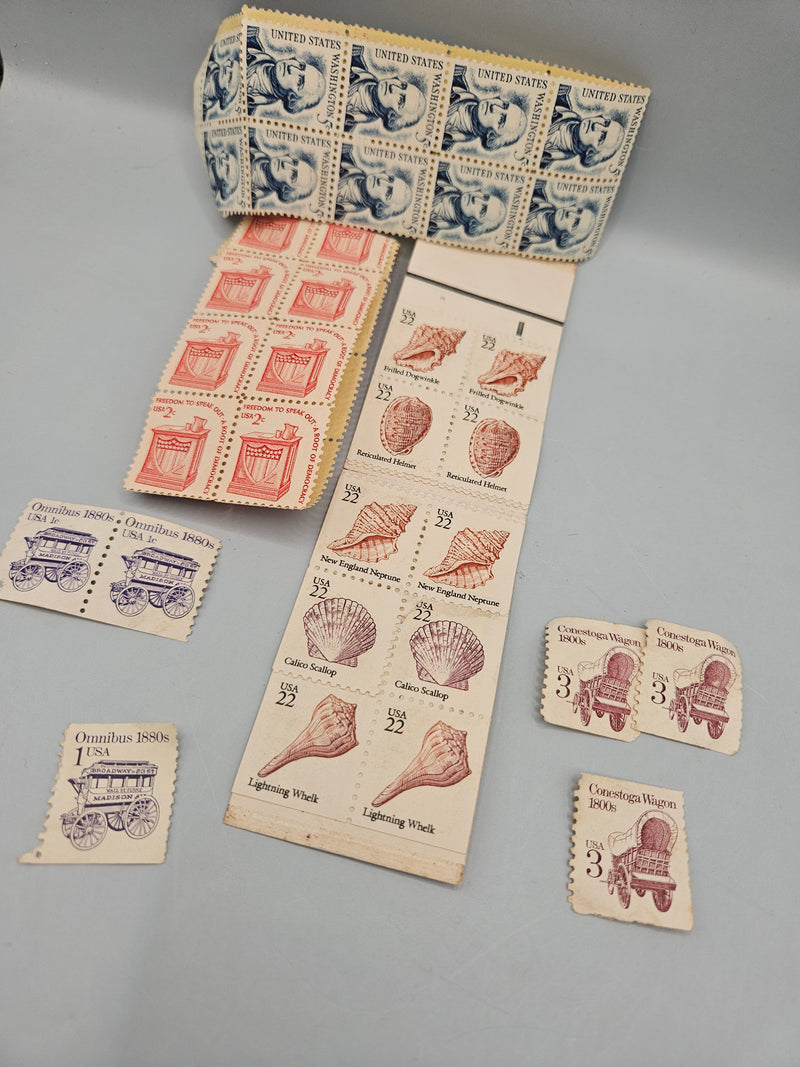 A collection of 86 vintage stamps featuring iconic designs like Freedom to Speak, George Washington, Omnibus 1880s, seashell, and Conestoga Wagon. Perfect for collectors, crafting, and scrapbooking