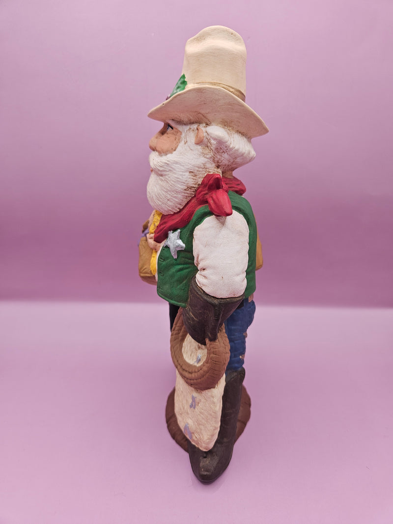 Handmade Western Santa with cowboy hat, toy bag, and lasso, 8.5"x4"