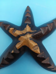 Hand-carved 4-inch ironwood starfish coastal déco