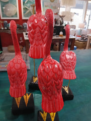 Hand-painted pink flamingo bird sculptures with metal legs on black bases, coastal-themed decorative figurines