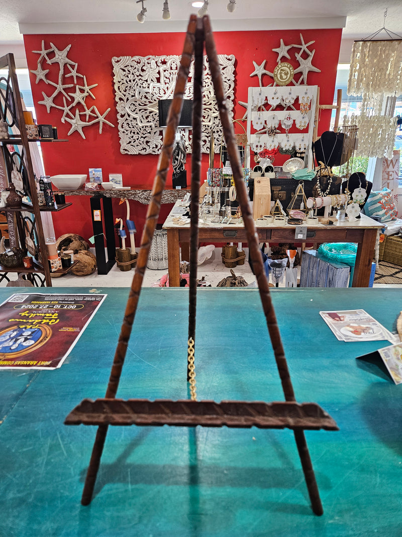 A vintage wooden easel standing 17.5" tall, with a rustic finish, perfect for small art projects, displays, or home decor.