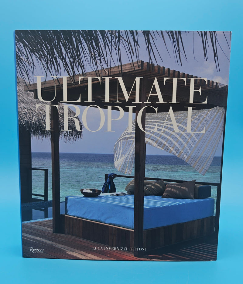 Ultimate Tropical hardcover book by Luca Invernizzi Tettoni, Rizzoli 2009 edition with photography of luxury tropical resorts and villas.