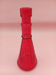 Miniature clear apothecary-style glass bottle with embossed design, no stopper, from Shell World