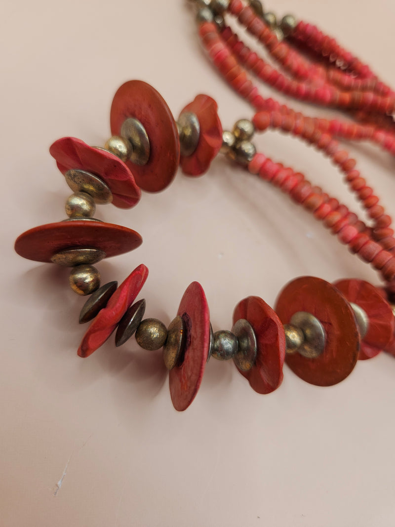 A 12.5" vintage Art Deco red bead necklace featuring bold red beads and a secure clasp, perfect for adding timeless