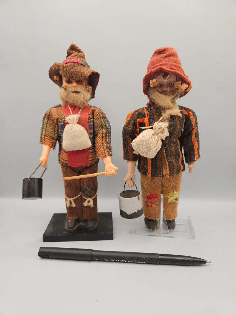 Close-up view of a vintage 8" Australian miner swagman doll, featuring a traditional hat, rugged clothing, and swag bag. The doll is a perfect representation of the iconic Australian Outback style.