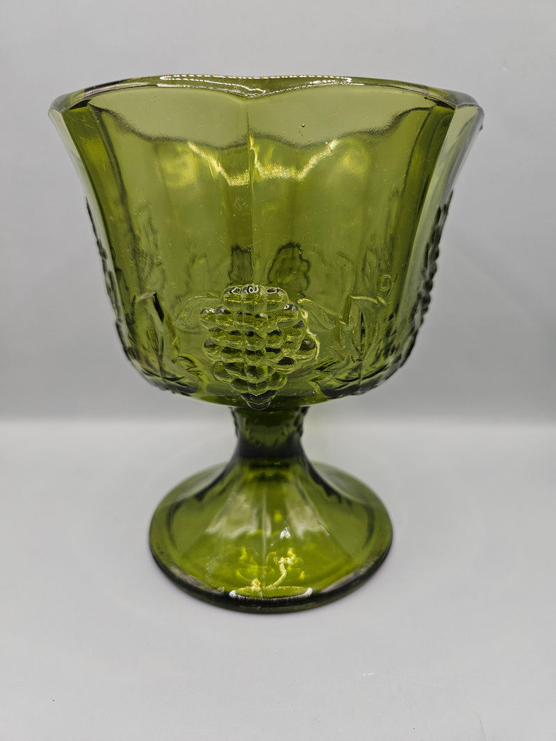  vintage Colony Glass Harvest Green Grape Panel footed planter vase, measuring 6.5"x5.25", featuring grape panel detailing, perfect for home decor or as a planter.

