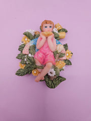 Fairy garden magnets with pastel wings and floral designs, each measuring approximately 3 inches.