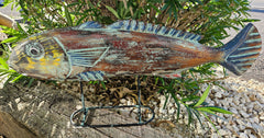 Decorative wooden multicolor fish sculpture mounted on stand, 31 inches by 14 inches, ideal for coastal and beach-inspired decor