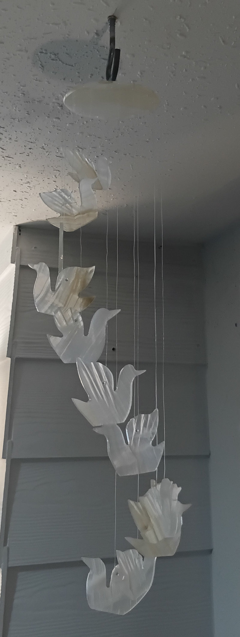 Hand-carved onyx bird wind chime with cascading stone birds, 17 inches long – Loving Coastal Living