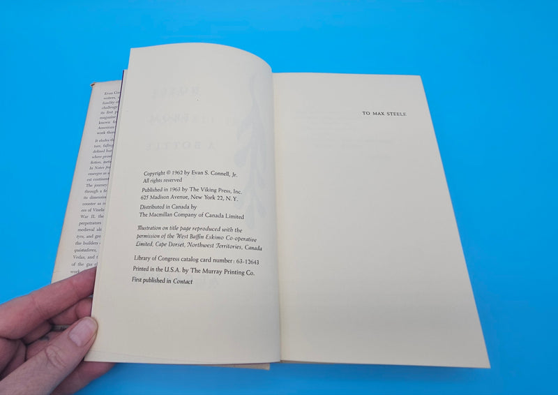 1963 first edition hardcover of Notes from a Bottle Found on the Beach at Carmel by Evan S. Connell Jr. with teal illustrated dust jacket and inscription.