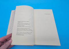 1963 first edition hardcover of Notes from a Bottle Found on the Beach at Carmel by Evan S. Connell Jr. with teal illustrated dust jacket and inscription.