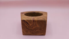 Curved-edge golden onyx candle holder with round tealight well and purple stone veining, 2.8x1.2 inches