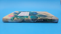Sea Glass Hunter’s Handbook hardcover by C.S. Lambert, 2010 edition with tips and photos for identifying and collecting sea glass.