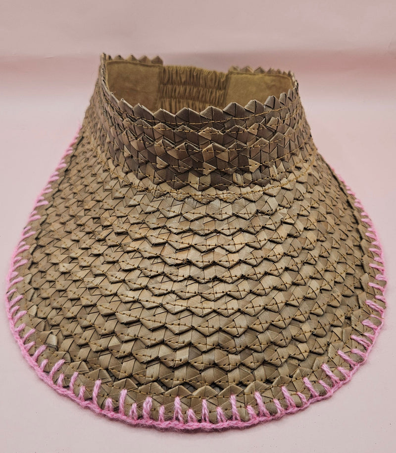 woven palm leaf visors with colorful edge stitching in black, pink, yellow, and light pink